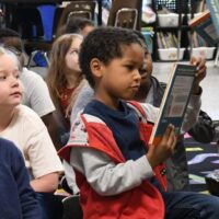 14134771929320926760 Rotarians give a book to every student at East Aiken School of the Arts