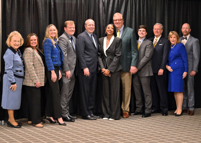 Rotary club board and symposium committee and partner
